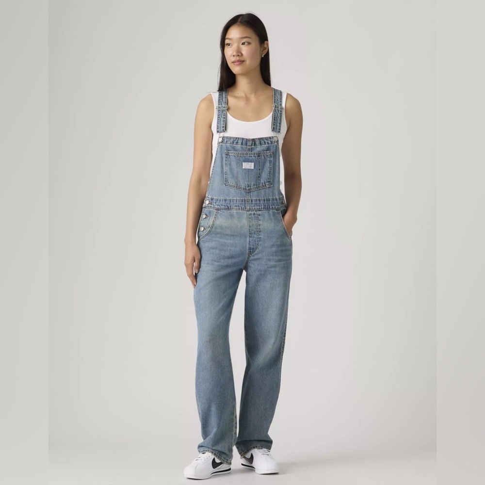 Levi's light blue denim overalls with white lining
